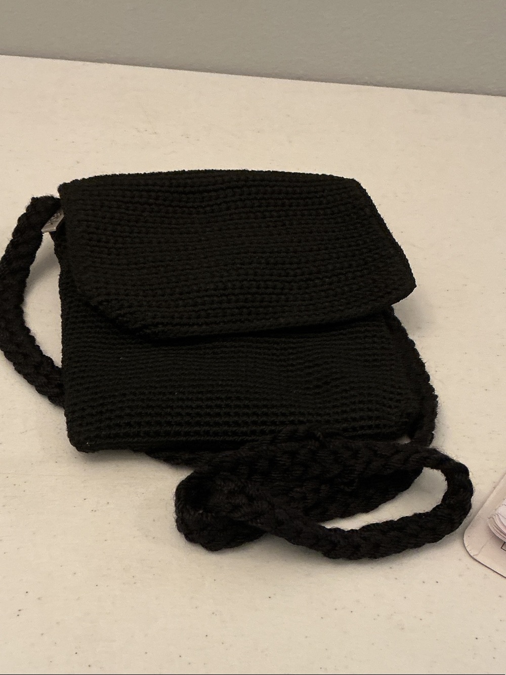 The Sak Black Crochet Fold-Over Crossbody Bag